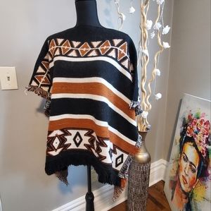 One size KAOS Poncho. NICE AND WARM
